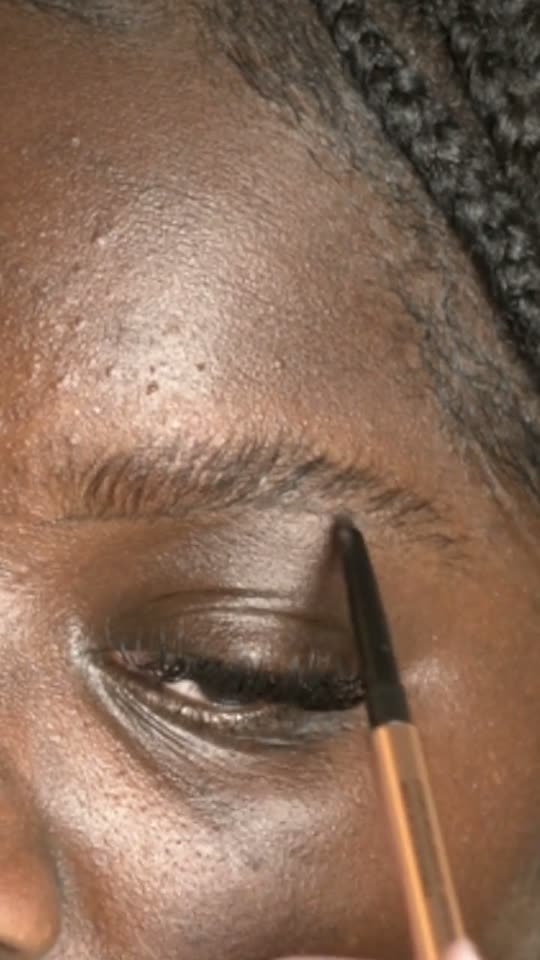 Eyebrow grooming in close-up