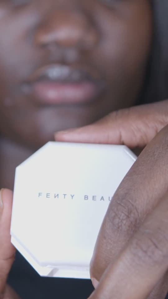 Fenty Beauty powder applied to camera