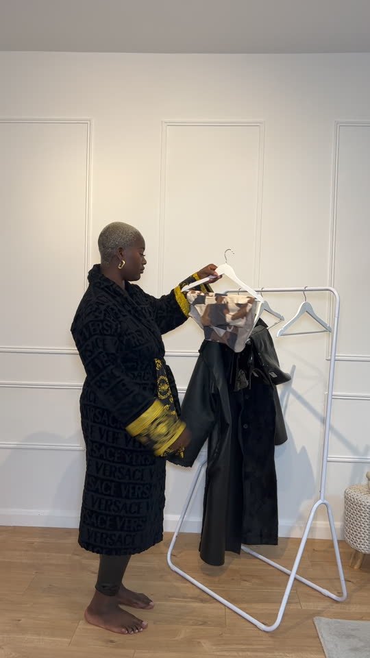 Leggings and coats tried on beside a clothes rail